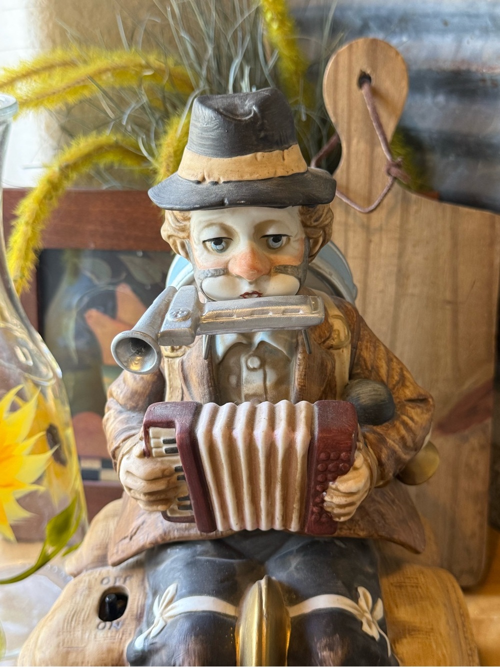 Hand-Painted Accordion Player Figurine in Brown and Tan
